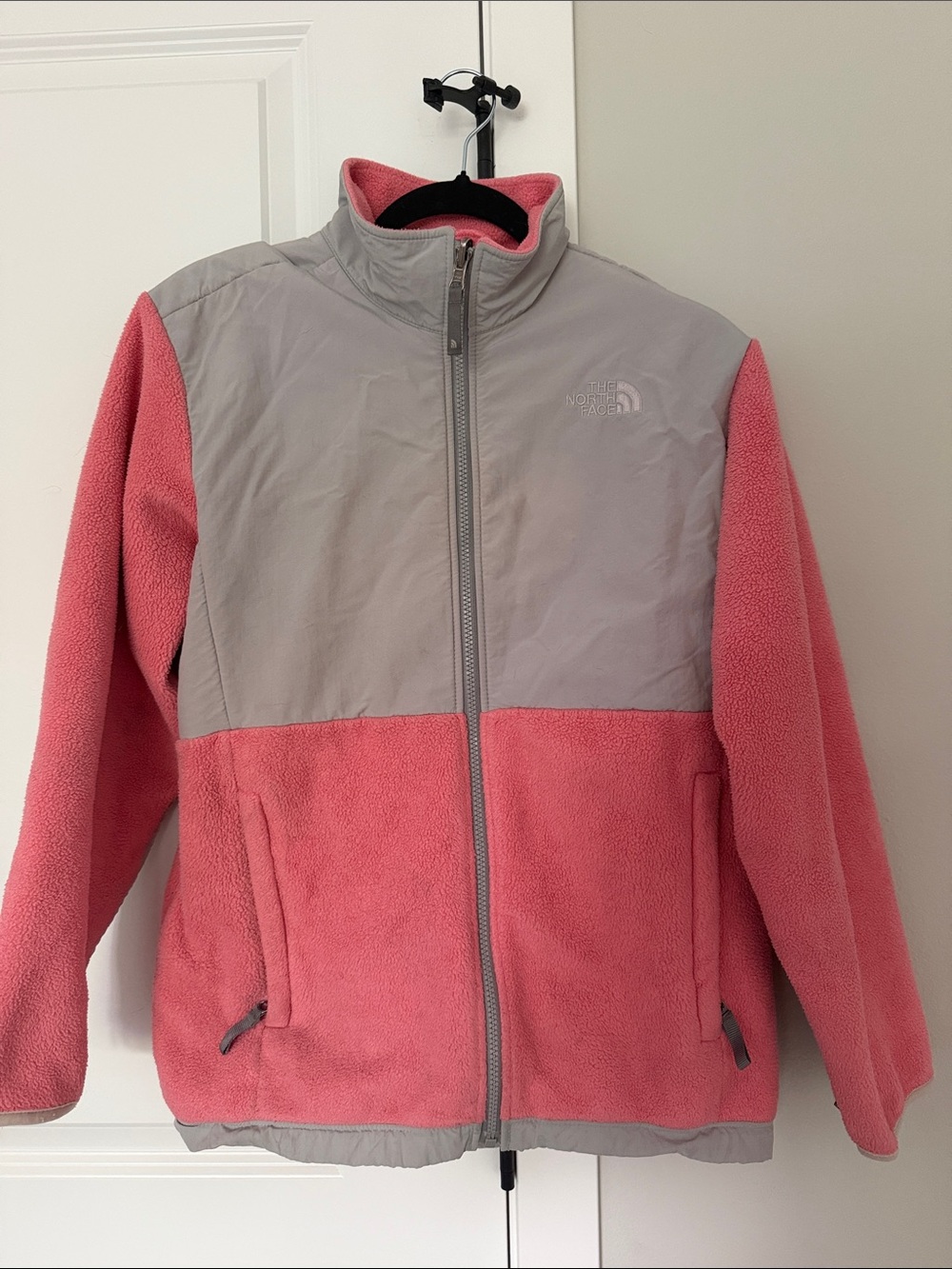 The North Face Girls Xl or women’s large pink and Gray Fleece Jacket